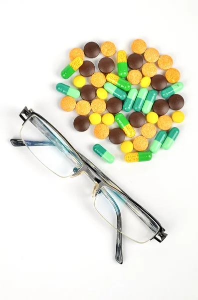 Medicine and glasses — Stock Photo, Image