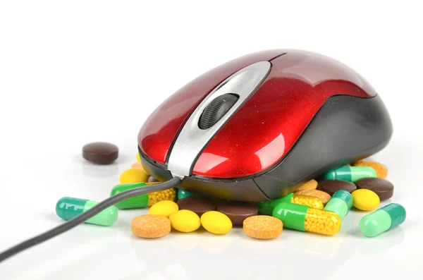 Medicine and computer mouse — Stock Photo, Image