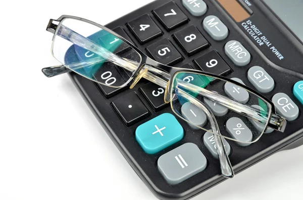 Calculator and glasses — Stock Photo, Image