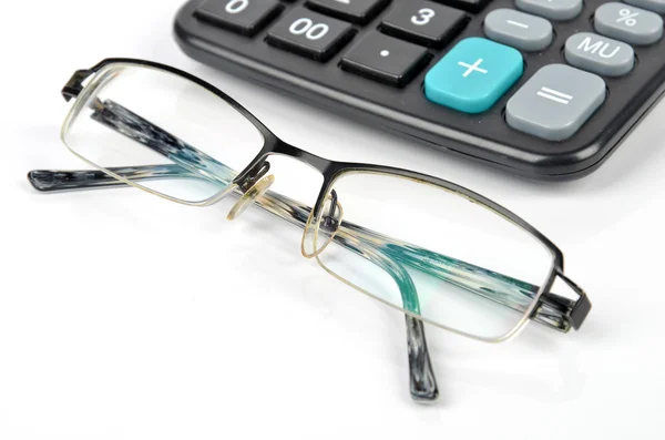 Miniräknare och glasögon — Stockfoto