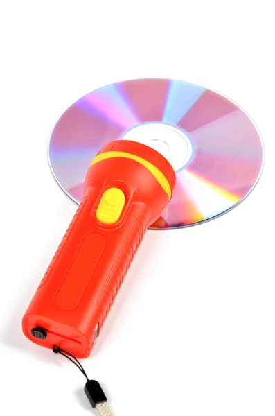 DVD e lanterna — Fotografia de Stock