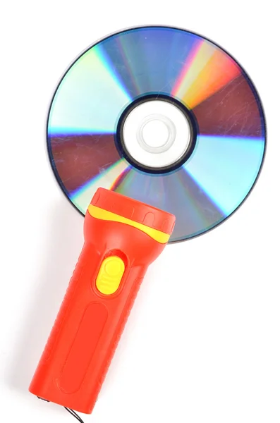 DVD and flashlight — Stock Photo, Image
