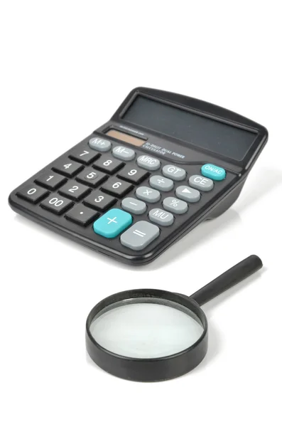 Увеличитель и калькулятор — стоковое фото
