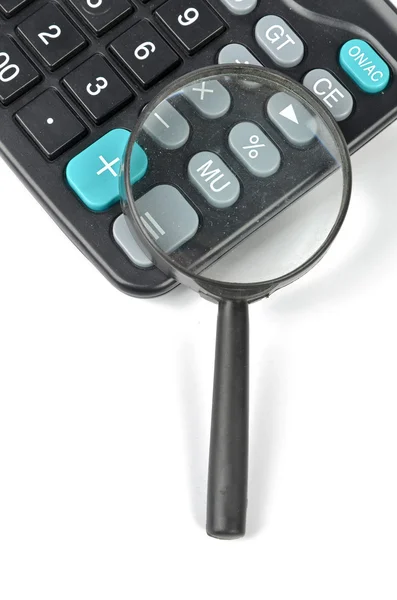 Magnifier and calculator — Stock Photo, Image