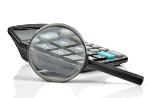 stock image Magnifier and calculator