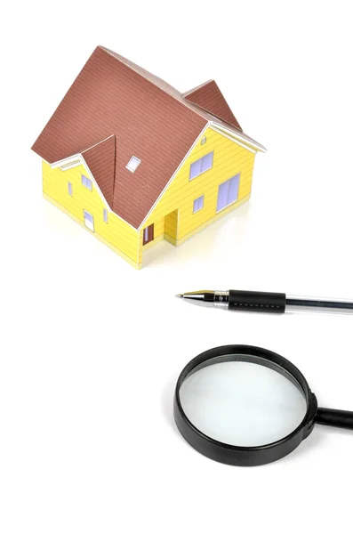 stock image Magnifier and model house