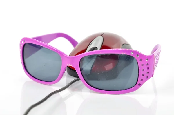 Sunglasses and computer mouse — Stock Photo, Image