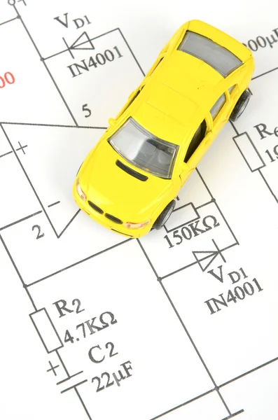 Okruh diagram a hračka auto — Stock fotografie