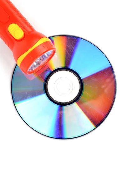 DVD и фонарик — стоковое фото