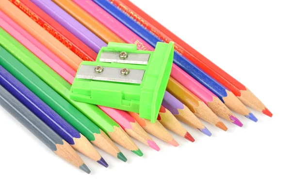 Color pencils and sharpener Royalty Free Stock Images