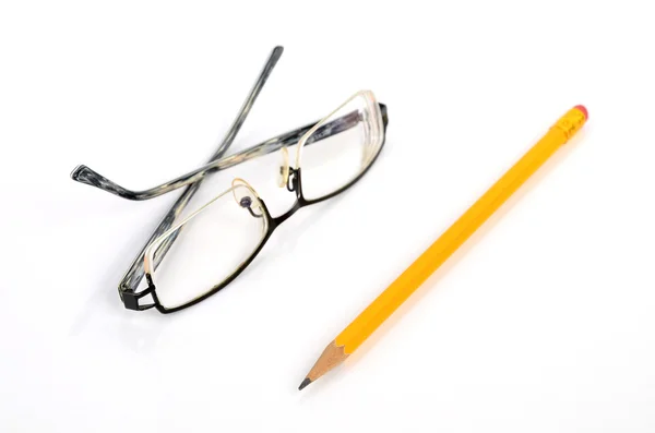 Dioptrické brýle a tužka — Stock fotografie