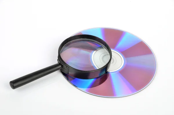 DVD und Lupe — Stockfoto