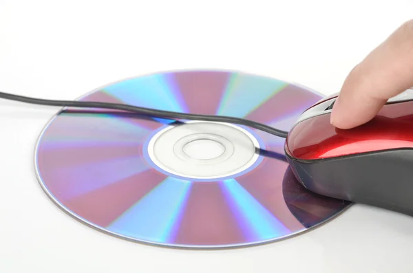 DVD a červené počítačová myš — Stock fotografie
