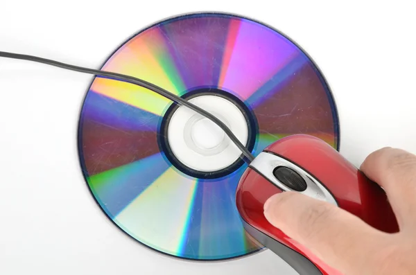 DVD και κόκκινο ποντίκι του υπολογιστή — Φωτογραφία Αρχείου