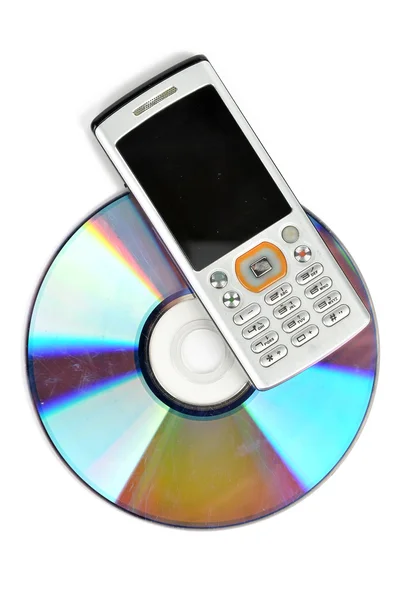 DVD e telefone celular — Fotografia de Stock