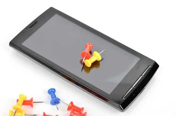 Akıllı telefon ve itme pin — Stok fotoğraf