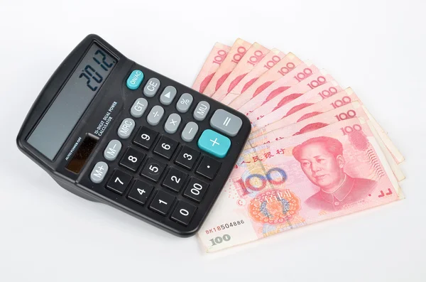 Китайська валюта і калькулятор — стокове фото