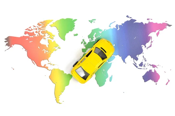 Игрушечный автомобиль и карта мира — стоковое фото