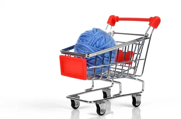 stock image Wool ball and shopping cart