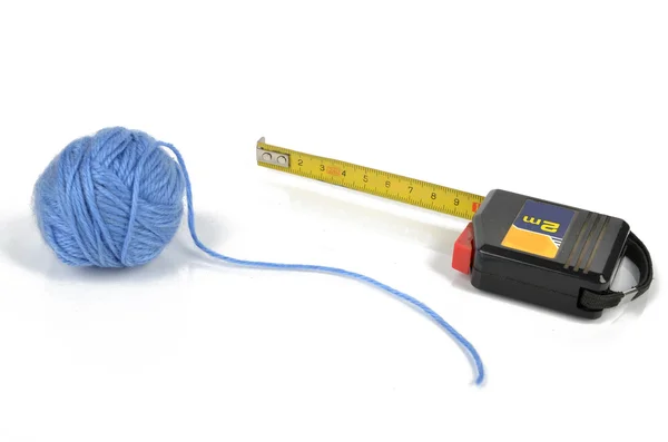 Steel tape and wool ball — Stock Photo, Image