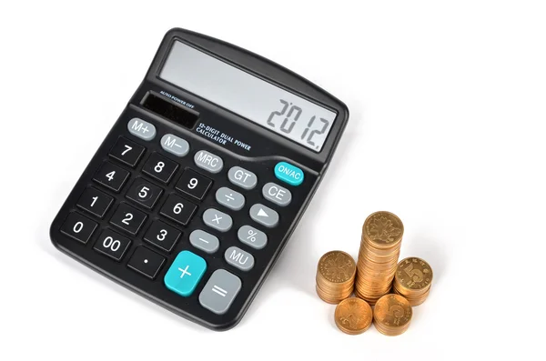 Coins and calculator — Stock Photo, Image