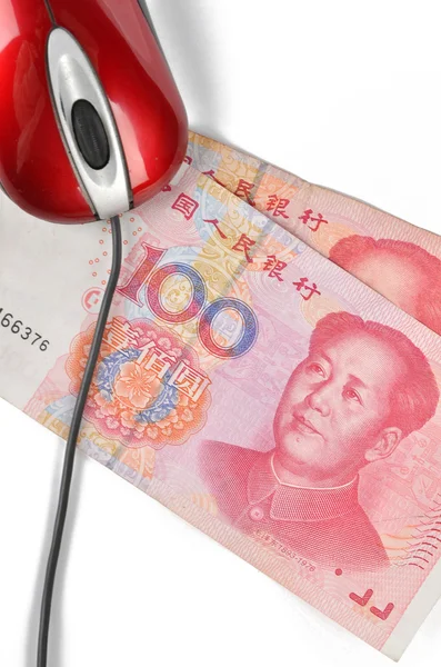 Комп'ютерна миша і китайська валюта — стокове фото