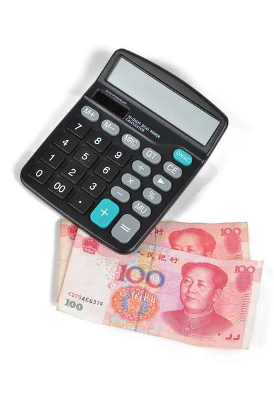 Calculadora e moeda chinesa — Fotografia de Stock