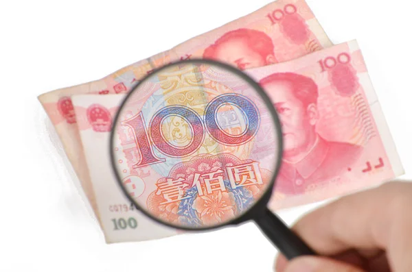 中国の通貨と megnifier — ストック写真