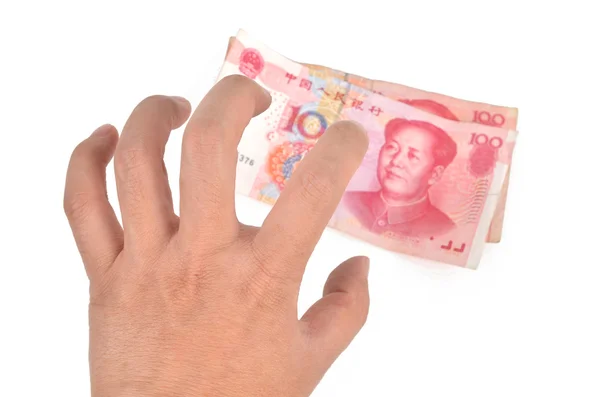 Китайская валюта и рука — стоковое фото