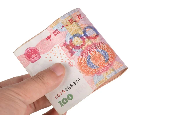 Valuta e mano cinese — Foto Stock