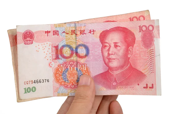 Chinese munt en hand — Stockfoto