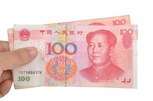 Chinese currency and hand — Stock Photo, Image