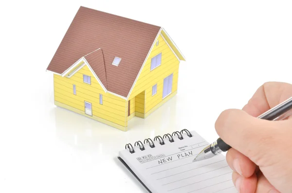 Model ev ve kalem ile not etmek — Stok fotoğraf