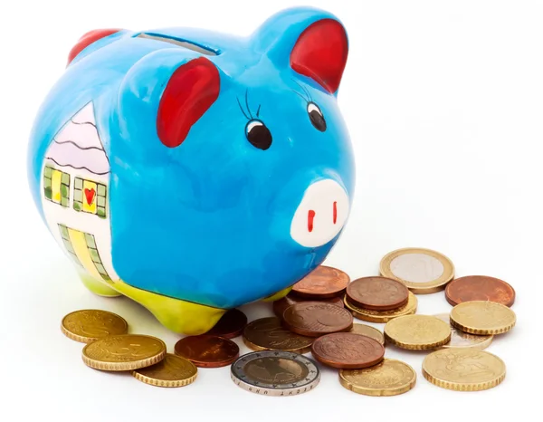 Hand painted moneybox with coins — Stock Photo, Image