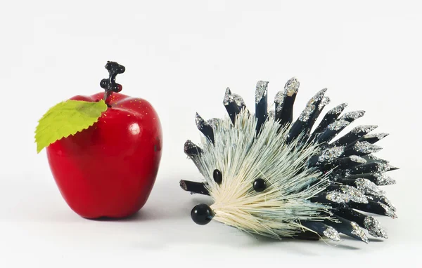 Decorative hedgehog with apple — Stock Photo, Image