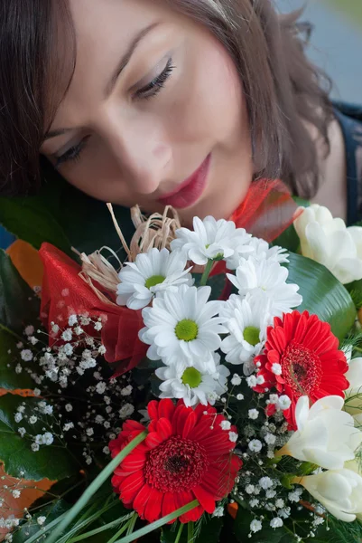 Woman face with bouquet — Stock Photo, Image