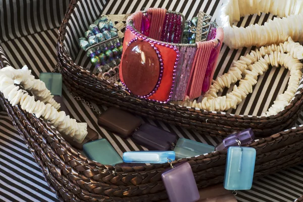 Costume jewelry in basket — Stock Photo, Image