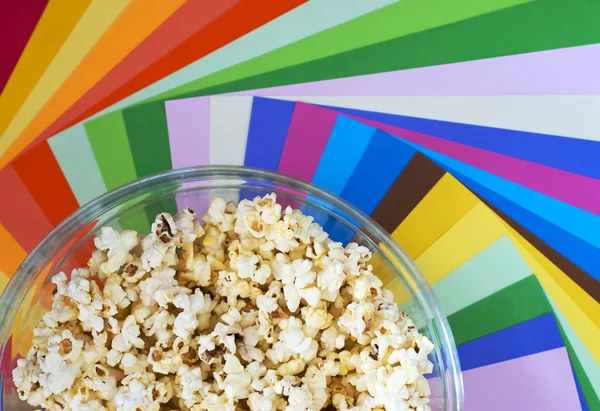 stock image Popcorn with colour papers