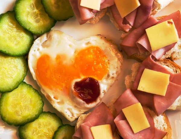 Fried egg on heart — Stock Photo, Image