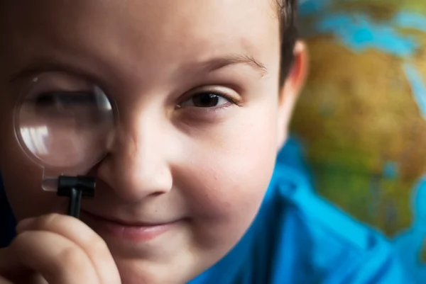 stock image Boy with magnifying glass