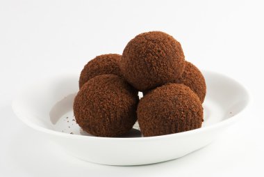 Chocolate balls in cacao clipart