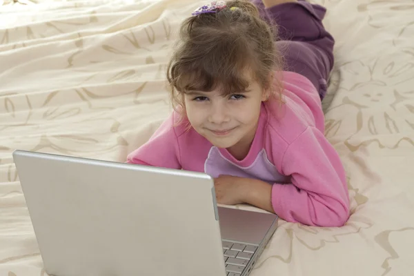 Smiling with laptop — Stock Photo, Image