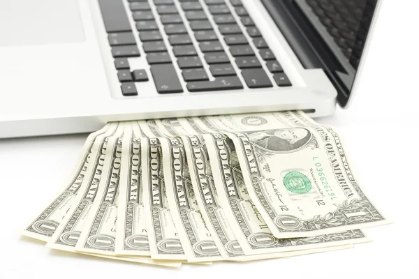 Laptop contant geld Rechtenvrije Stockfoto's