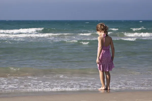 stock image Walking on the beach