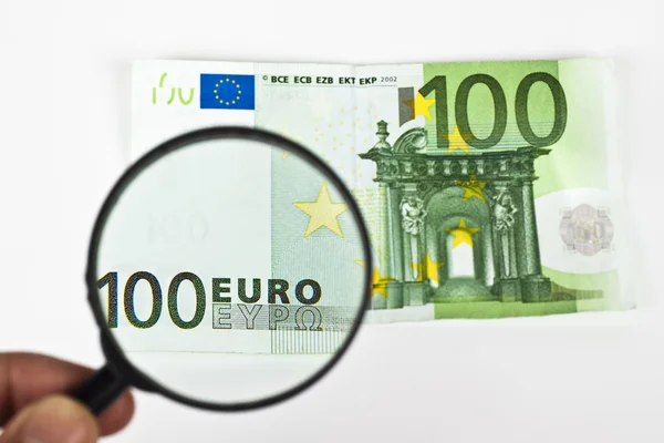 Vergrootglas euro — Stockfoto