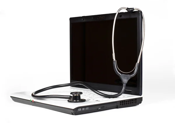 Laptop og stetoskop – stockfoto