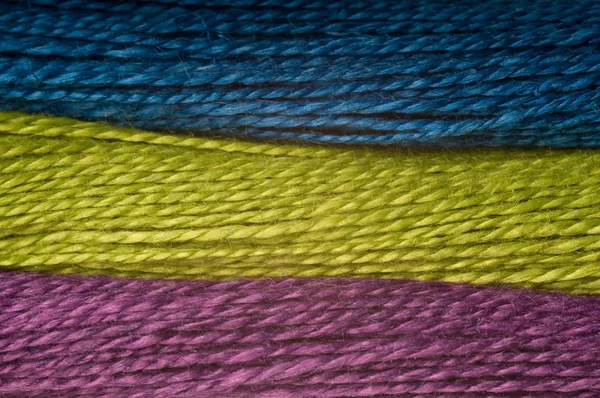 Tre färger av trådar — Stockfoto