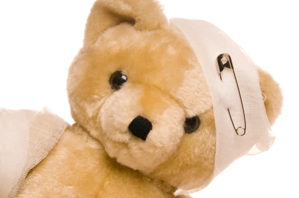 Stock image Teddy bear with bandage