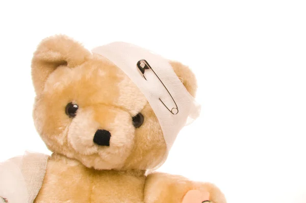 Nallebjörn med bandage — Stockfoto