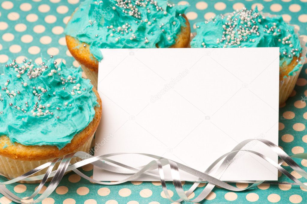 Cupcakes with a blank invitation